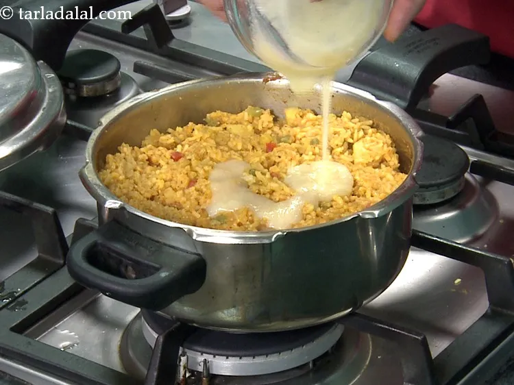 Step 45 – Add 3 tbsp&nbsp;<a href="https://www.tarladalal.com/glossary-ghee-245i">ghee</a>&nbsp;and mix well.