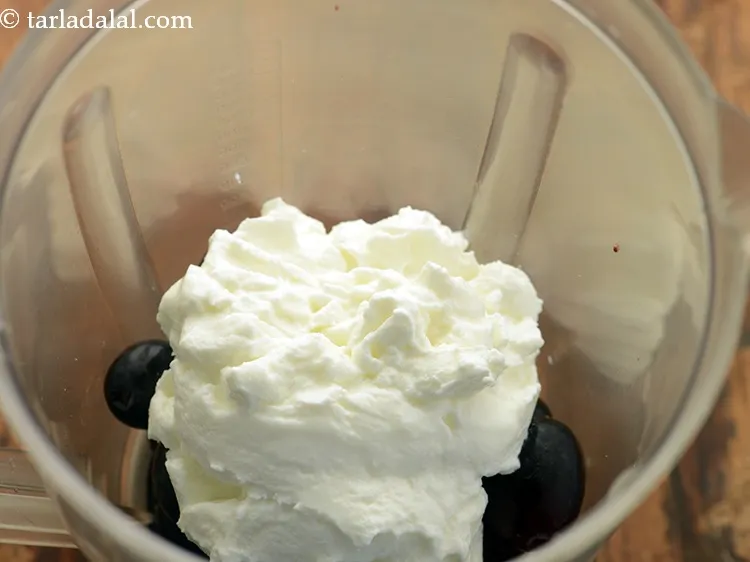 Step 3 – Add curds. Use nice and thick curd to get proper smoothie consistency.