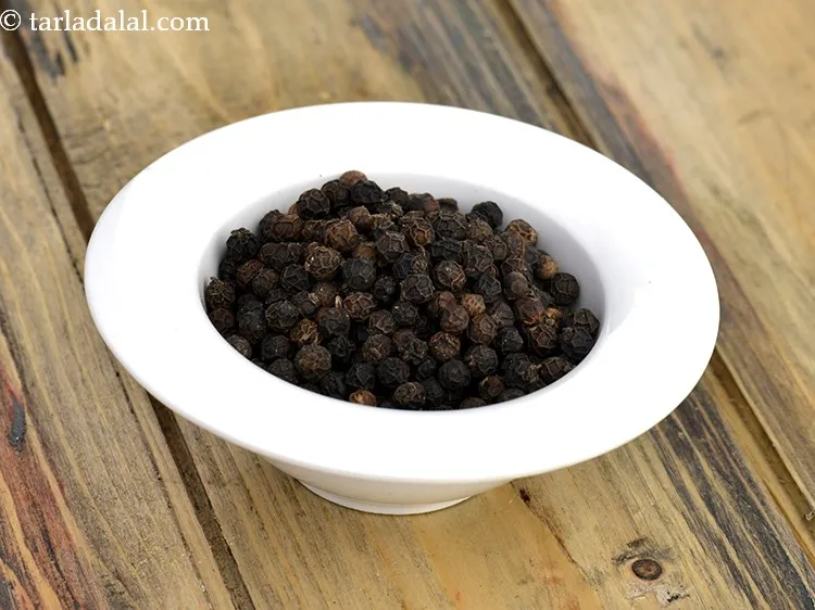 Step 14 – Add 6&nbsp;whole&nbsp;<a href="https://www.tarladalal.com/glossary-black-peppercorns-kali-mirch-kalimirch-566i">black peppercorns (kalimirch)</a>.