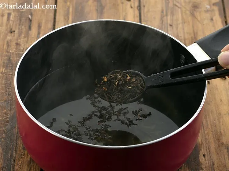 Step 21 – Add the tea leaves and cover with a lid to prevent the aroma of the …