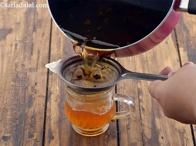 Step 23 – Strain the tea using a tea strainer.