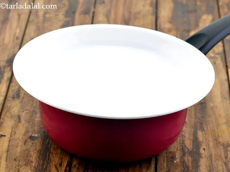 Step 7 – Cover with a lid. The lid will seal the saucepan and will not let the …