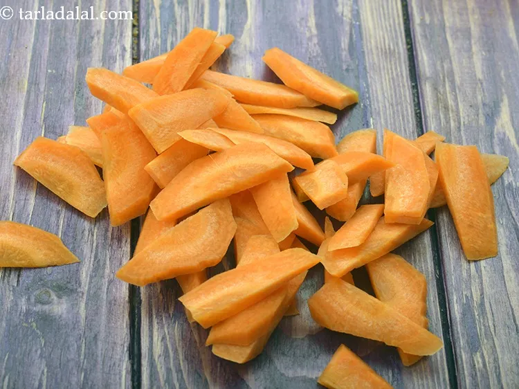 Step 19 – Add 1/2 cup&nbsp;<a href="https://www.tarladalal.com/glossary-blanched-and-diagonally-cut-carrot-2344i">diagonally cut and blanched carrot</a>.&nbsp;<a href="https://www.tarladalal.com/recipes-using-carrot-253">Carrots</a>&nbsp;have the nutrient Beta Carotene which is …