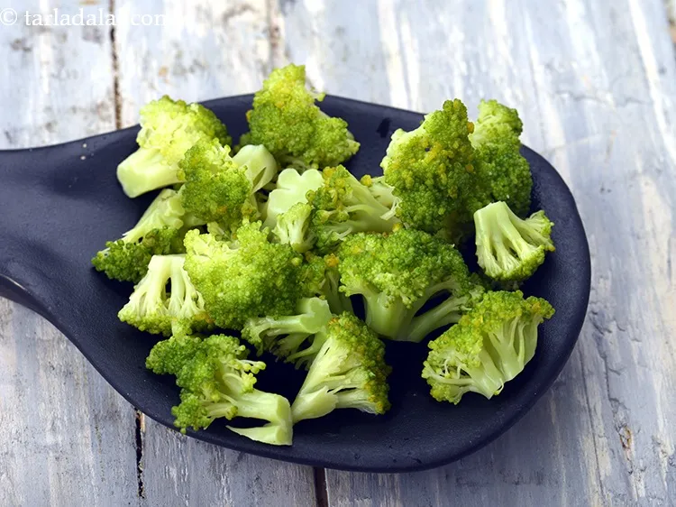 Step 14 – Add 1/2 cup&nbsp;<a href="https://www.tarladalal.com/glossary-blanched-broccoli-florets-719i">blanched broccoli florets</a>.