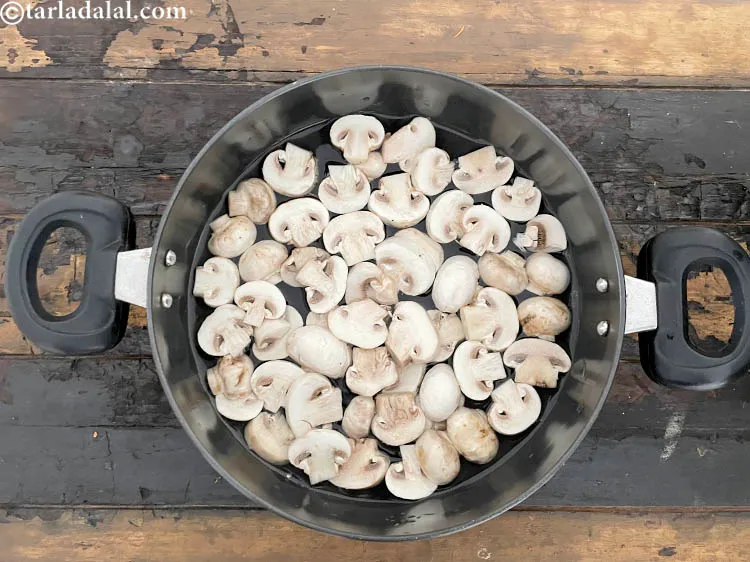 Step 18 – Add sliced mushrooms to the pot containing boiling water and allow them to cook for …