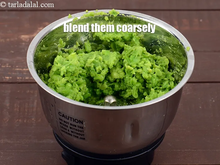 Step 15 – Blend them coarsely. This is how boiled and coarsely crushed fresh green peas looks like.