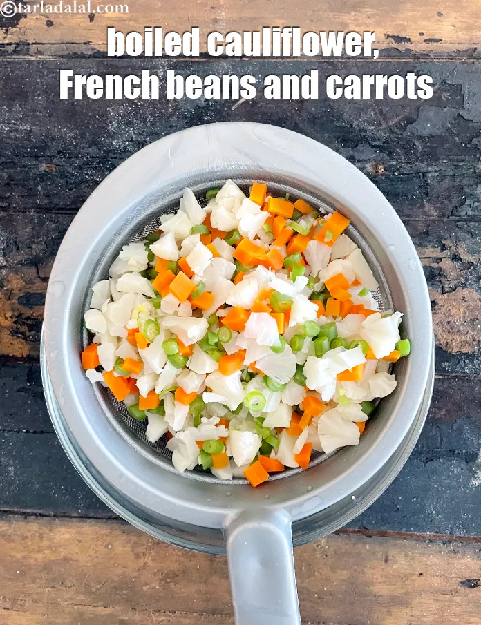 Step 44 – Boil&nbsp;cauliflower, carrots and french beans together when making the tikki. It will save time.
