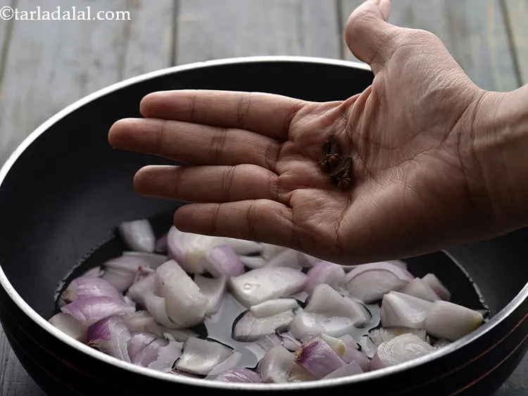 Step 5 – Add the cloves.