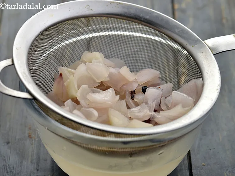 Step 10 – When it cools, drain the water and transfer to a mixer jar.