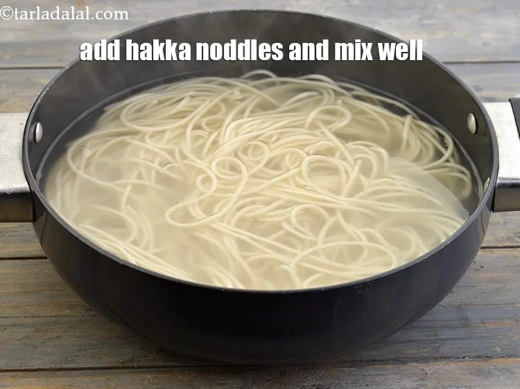 Step 9 – Add the hakka noddles and mix well. We have taken 1 &frac12; &nbsp;packet of hakka …