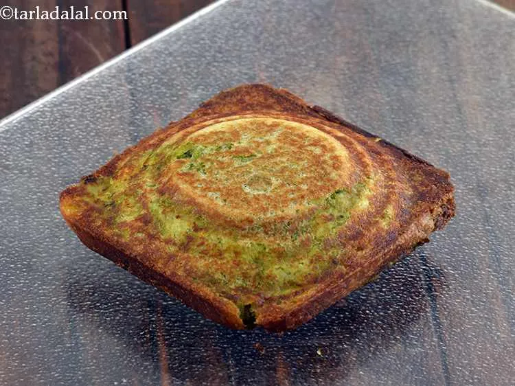 Step 26 – Place the sandwich in the sandwich toaster and cook on a medium flame, till it …