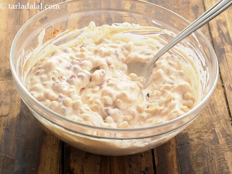 Step 8 – Mix&nbsp;<strong>boondi and pomegranate&nbsp;raita |&nbsp;boondi anar raita |</strong>&nbsp;well using a spoon.