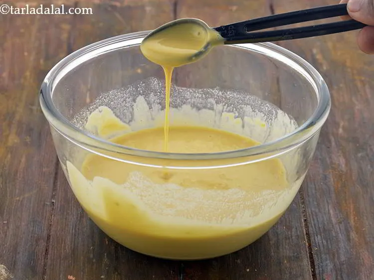 स्टेप 7 – घोल पॉरिंग कन्सिस्टन्सी का होना चाहिए। यह डोसा बैटर की …