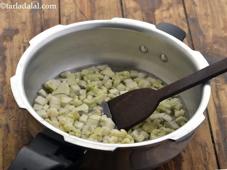 Step 24 – Mix well using a ladle.