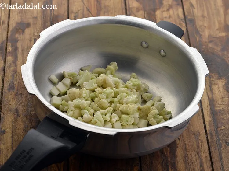 Step 22 – Then add the chopped cauliflower.&nbsp;