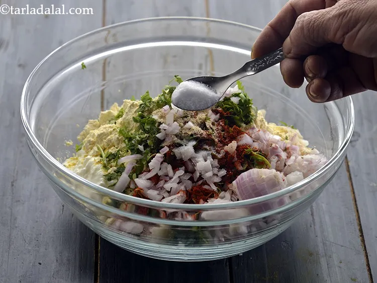 Step 11 – Add finely chopped onions and salt to taste. You can even add finely chopped caspicum, …