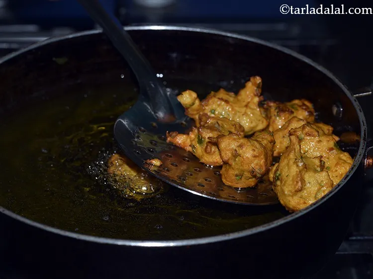 Step 22 – If oil is too hot bhajiyas will cook too fast and will not be crispy; …