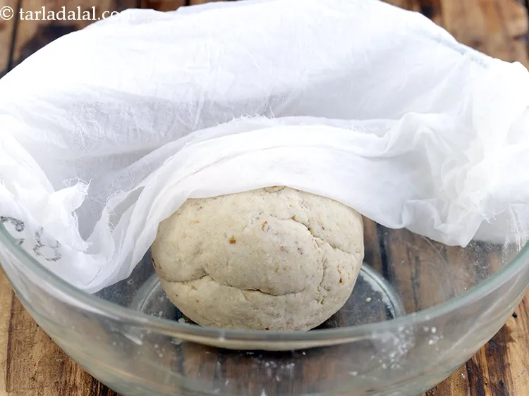 Step 13 – Cover the dough with a damp muslin cloth and keep aside in a warm place …