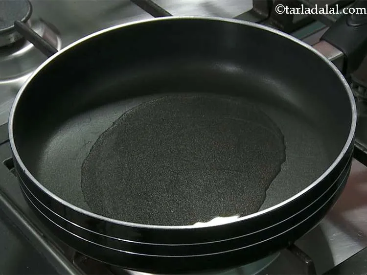 Step 15 – Heat 2 tbsp of oil in a broad nonstick pan.