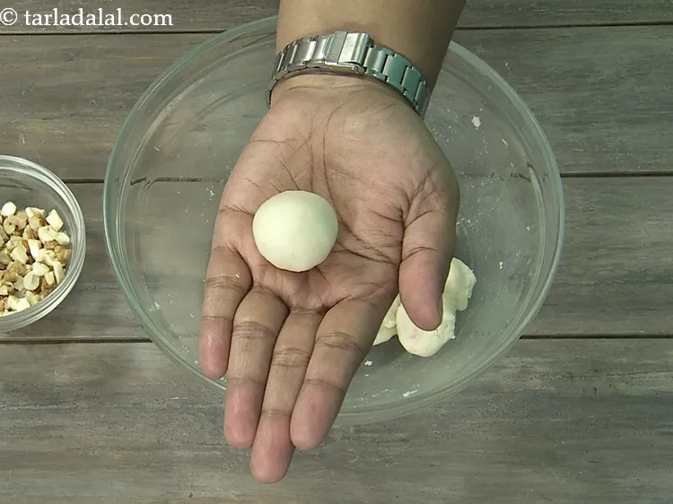 Step 33 – Ensure that there are no cracks on the surface while rolling and shaping the balls.&nbsp;