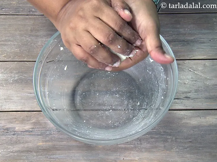 Step 13 – Knead in between your palms if necessary to smoothen the dough.&nbsp;