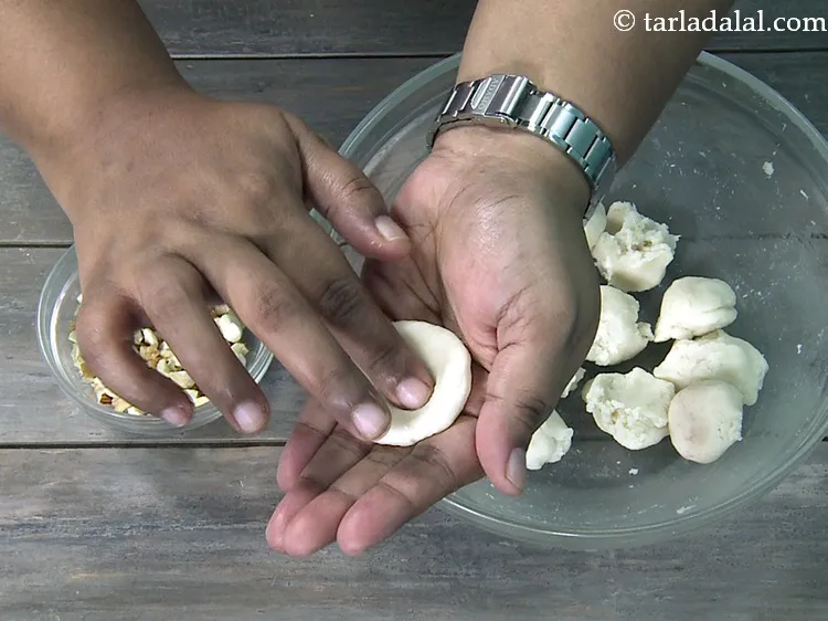 Step 18 – Make a small depression in the centre to put nuts.