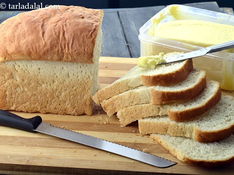 Step 9 – Learn&nbsp;<a href="https://www.tarladalal.com/bread-loaf-basic-white-bread-loaf-using-yeast-2448r" target="_blank"><strong>how to make bread at home</strong></a> in detail.