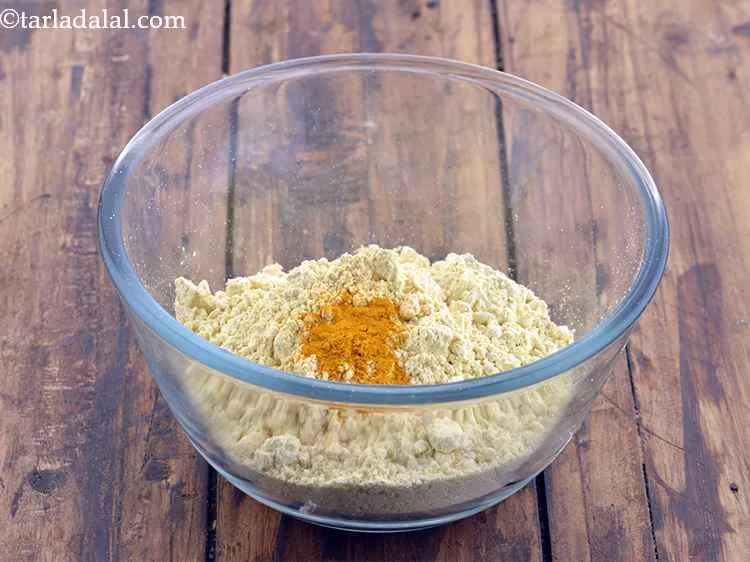 Step 14 – Add the turmeric powder (haldi) for the color.
