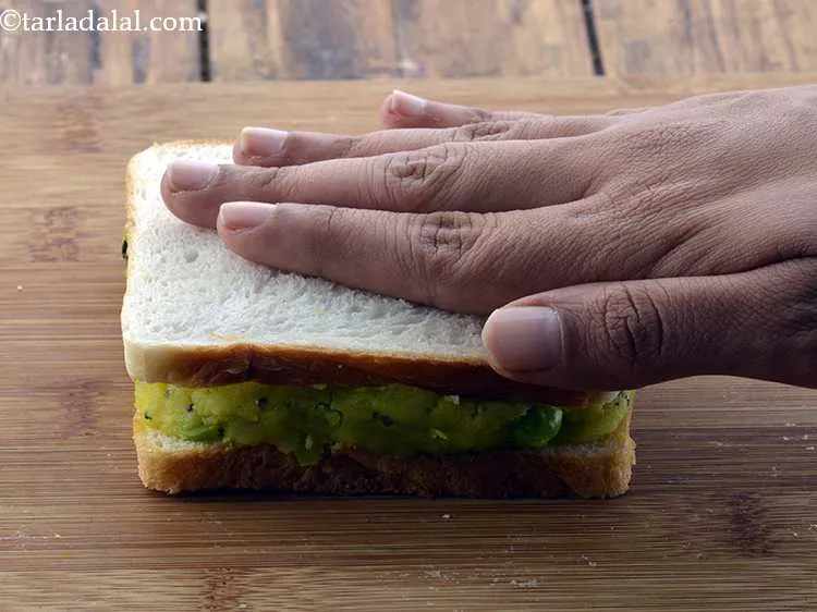 Step 24 – Press gently to ensure all ingredients are held together.