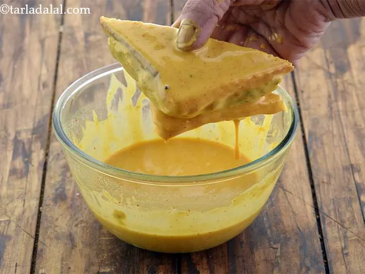 Step 26 – Dip one piece at a time in the batter.Stir the batter once before you dip …