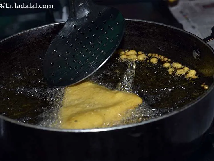 Step 27 – Deep-fry on a medium flame till it turns crisp and golden brown in colour from …