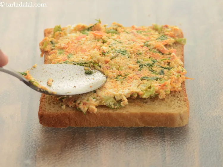 Step 18 – Spread a portion of the stuffing evenly over it.