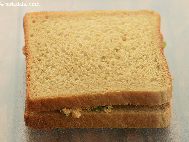 Step 19 – Place another slice of bread over it.