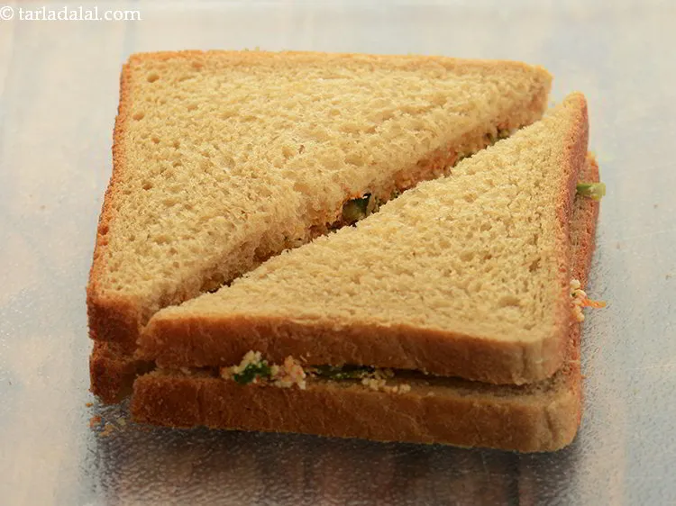 Step 20 – Press lightly and cut it diagonally into 2 equal pieces.