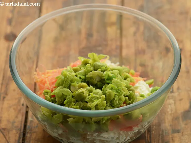 Step 4 – Add boiled and lightly mashed green peas. We have boiled the peas in a microwave …