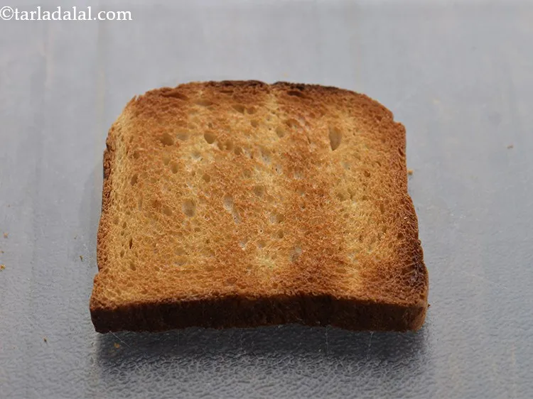 Step 3 – Place 1 toasted bread slices on a clean, dry surface.