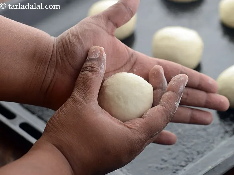 Step 17 – Roll each portion into a ball between your palm and kitchen countertop till smooth. You …