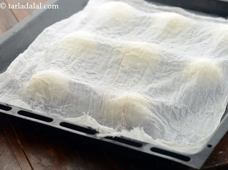 Step 18 – Cover the bread rolls with a damp muslin cloth fully but ensure it does not …