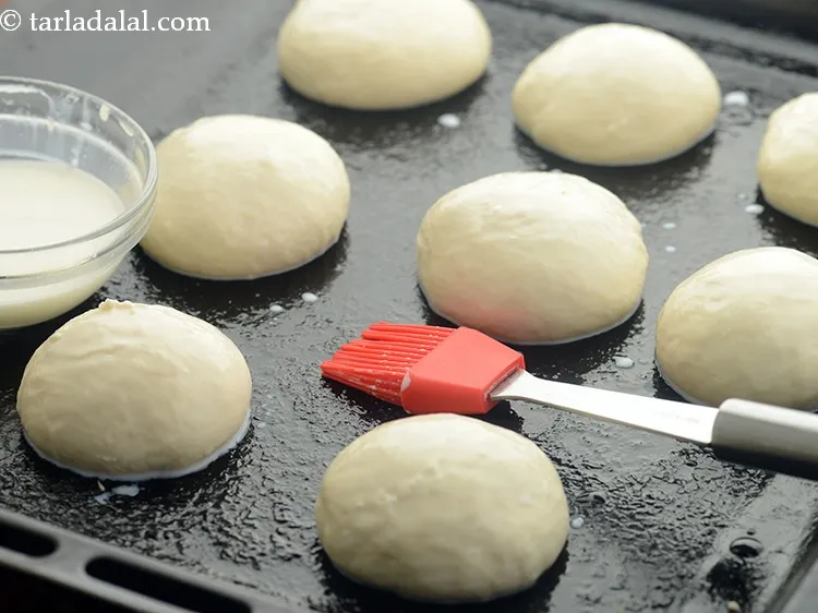 Step 20 – Brush little milk evenly over each roll.