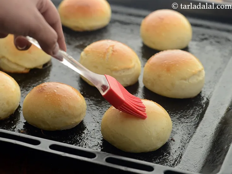 Step 22 – Immediately brush little butter/ oil and serve warm.