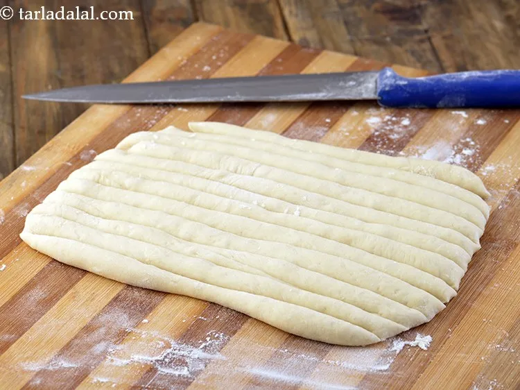 Step 16 – Cut it into 12 equal portions using a dusted sharp knife.