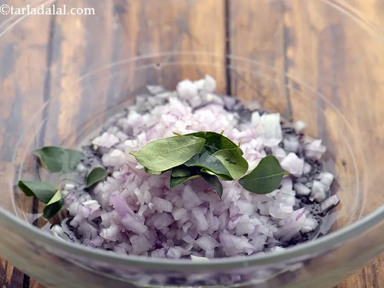 Step 8 – Add the curry leaves. Mix well and microwave on high for 1 minute.