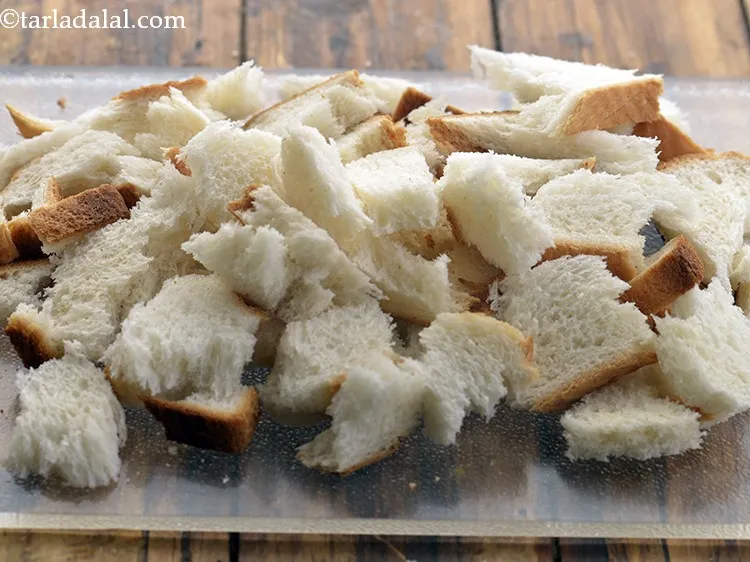 Step 3 – Roughly tear the pieces of bread as shown in the image.&nbsp;