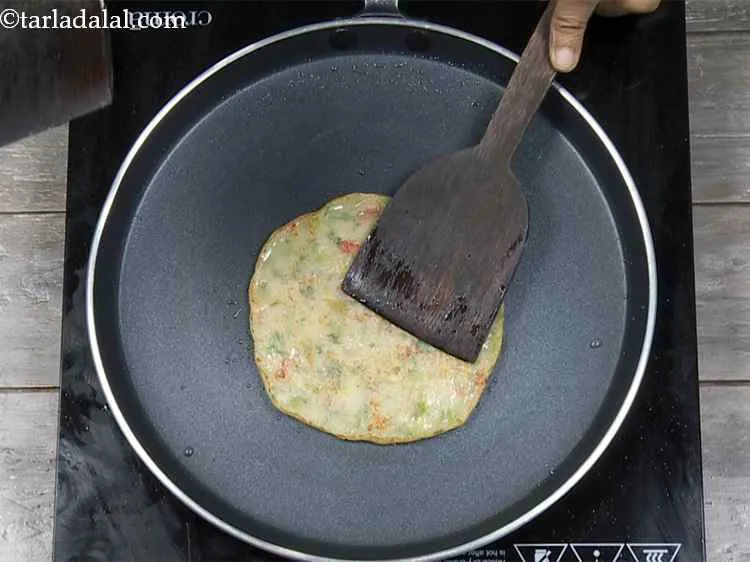 Step 18 – <p>Check if its cooked and turn around. Cook till golden brown on both sides.</p>
