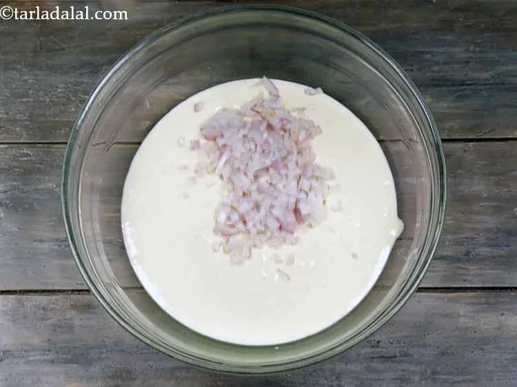 Step 7 – <p>Add finely chopped onions to it.</p>