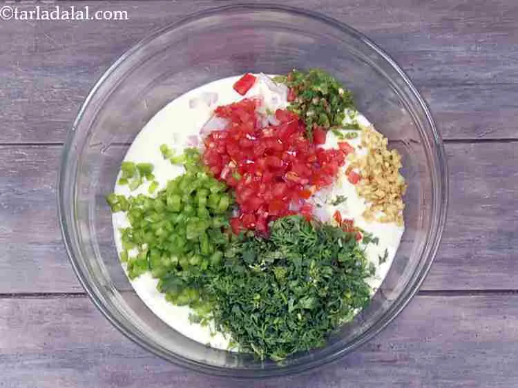 Step 12 – <p>Add finely chopped green chillies. They make the uttapam more exciting by adding some spicy …