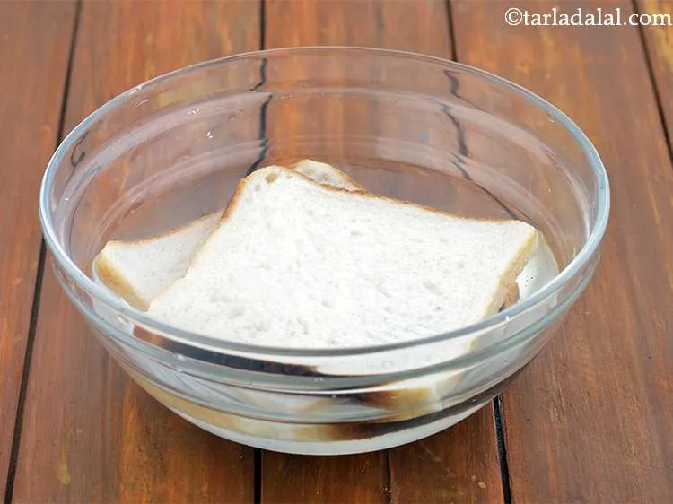 Step 3 – Soak the bread slices in enough water in a deep bowl for 1 minute. To …