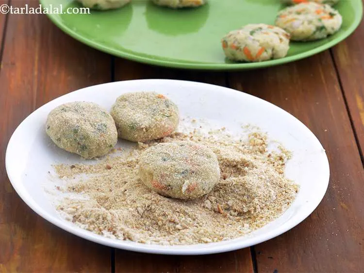 Step 14 – Roll them in the bread crumbs till they are coated from all the sides. They …