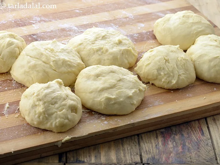 Step 43 – Divide the dough into 8 equal portions and roll each portion into a round.<br /> …