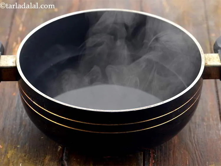 Step 6 – Heat 2 cups of water in a deep non-stick pan.